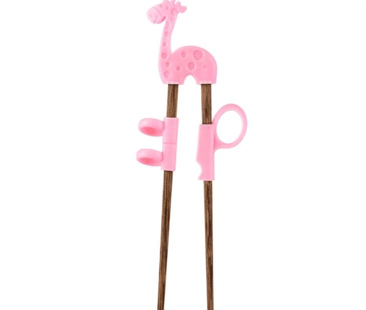 Children Learning Chopsticks With Silicone Helper